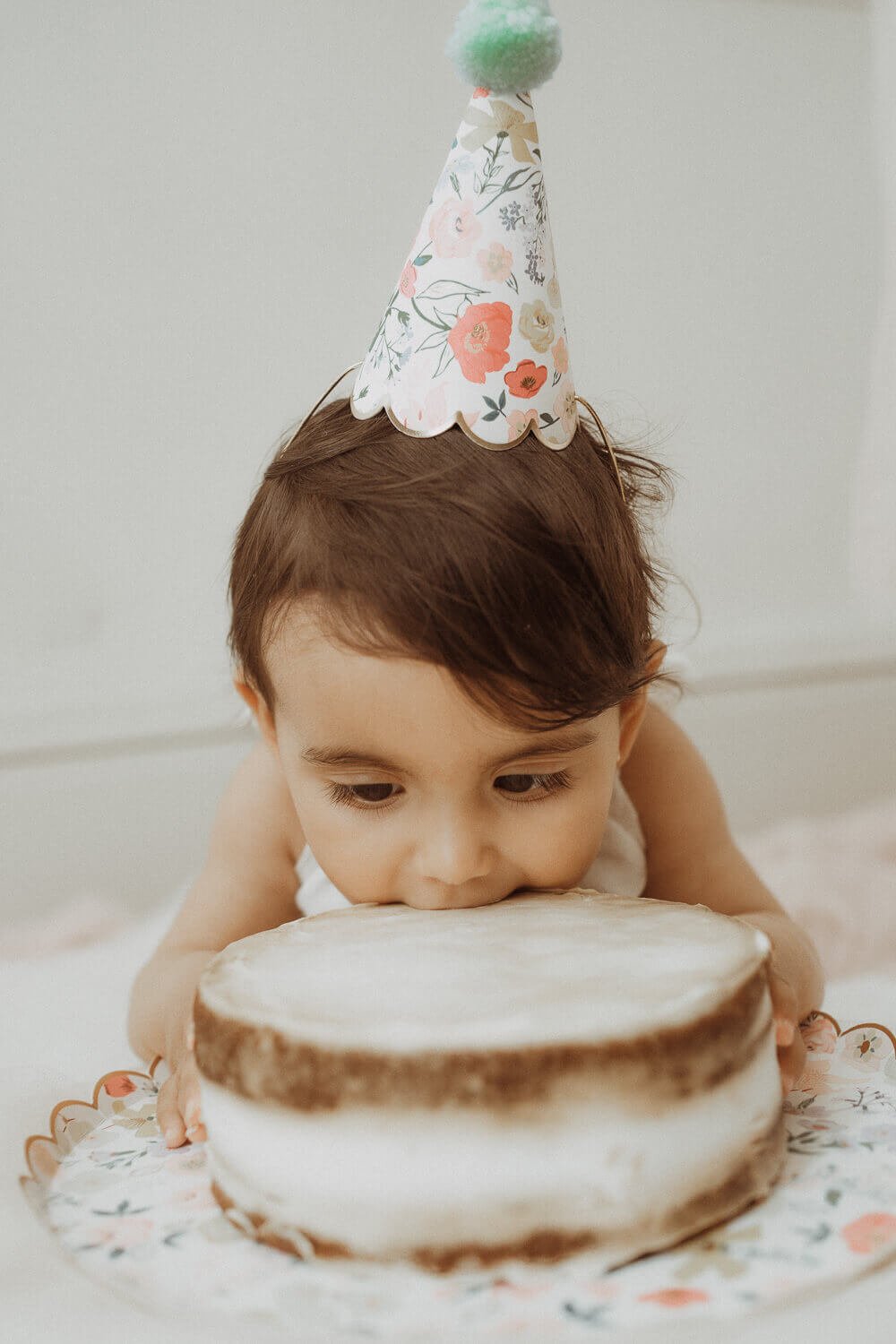 Babys first birthday with smash cake celebration.
