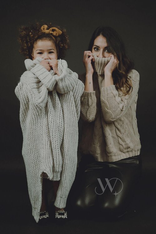 Mother And Child Playful Portrait In Sweaters