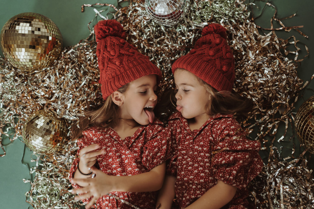 sisters red dresses christmas photos