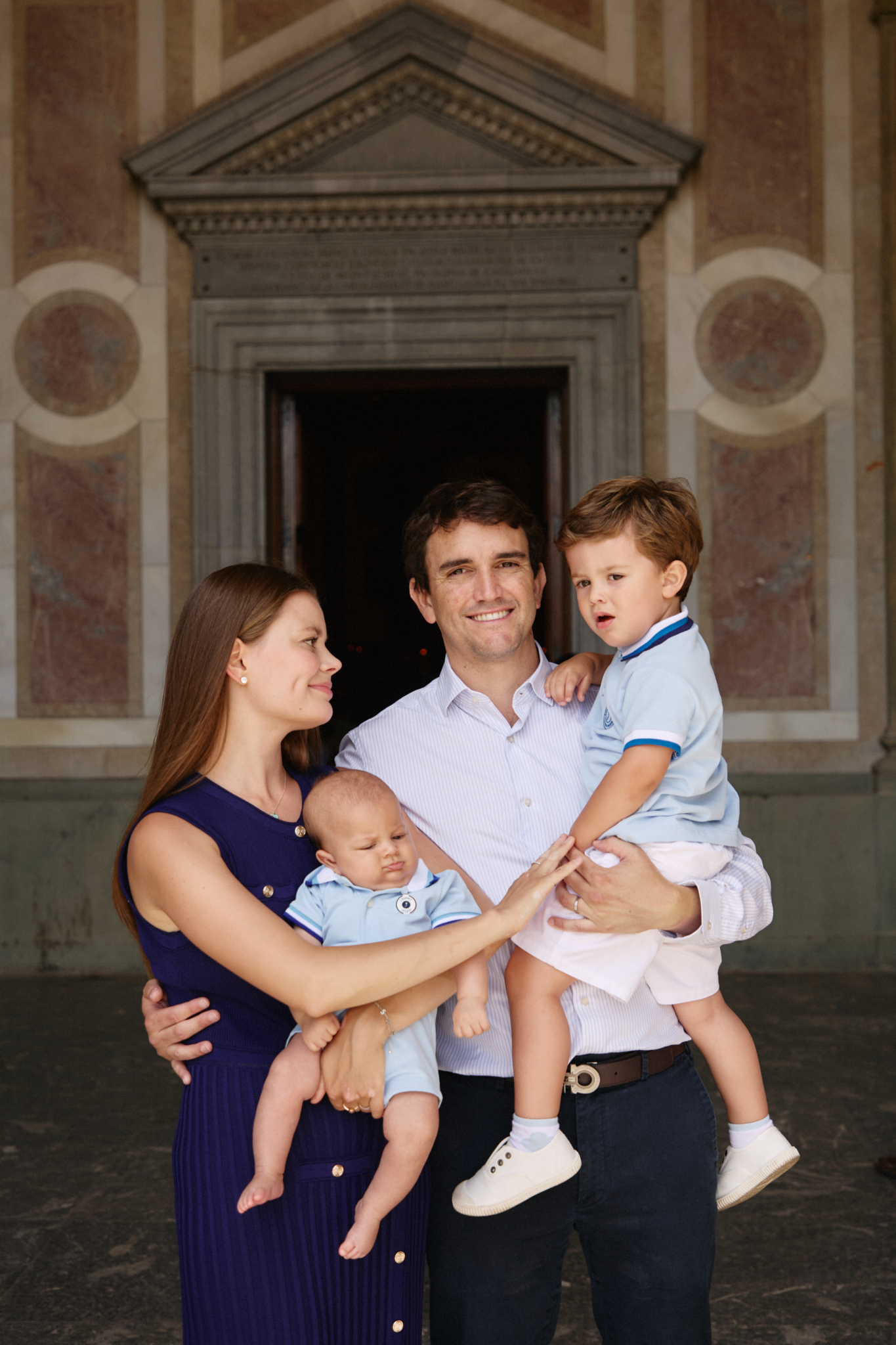 family of four church entrance baby family photos