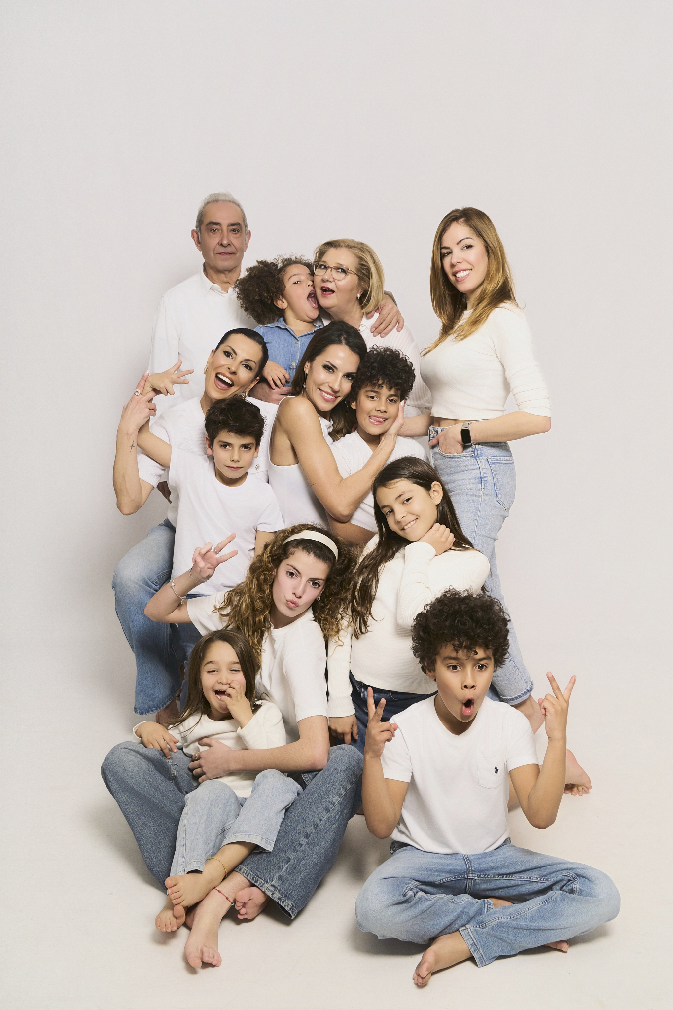 large multigenerational family original studio family photos fun poses