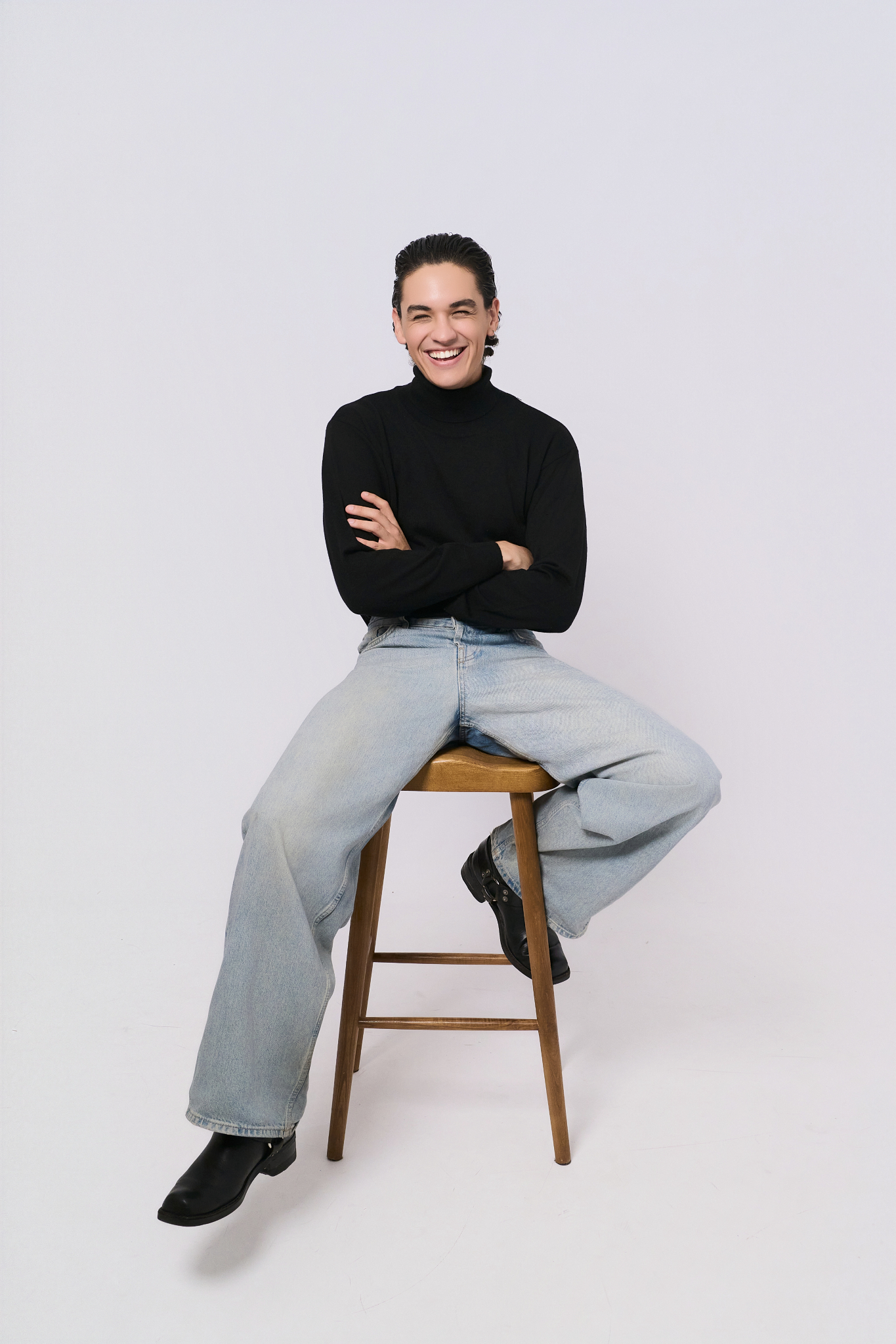 smiling woman family studio photo stool light jeans