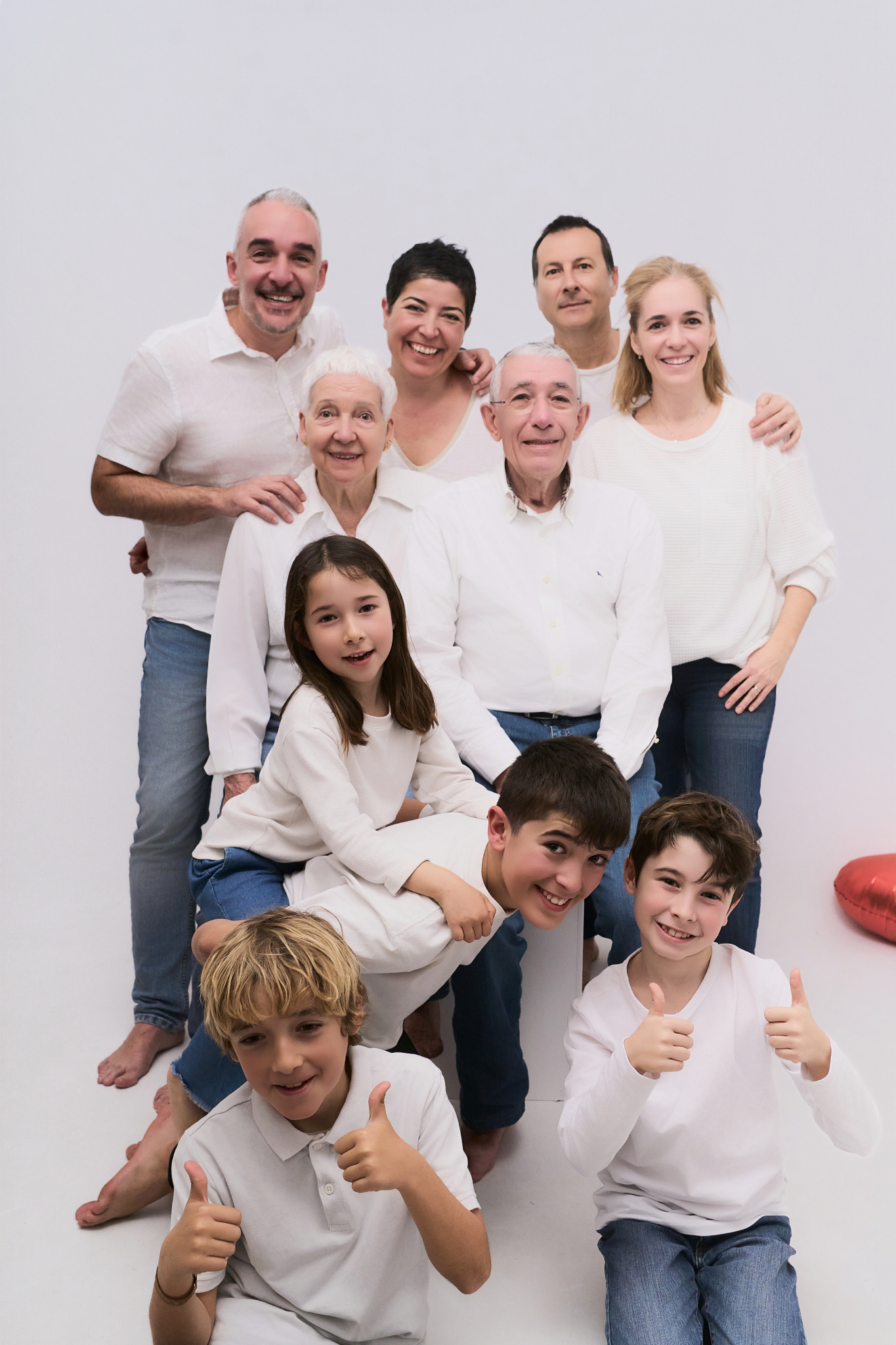 three generations white thumbs up large family photos
