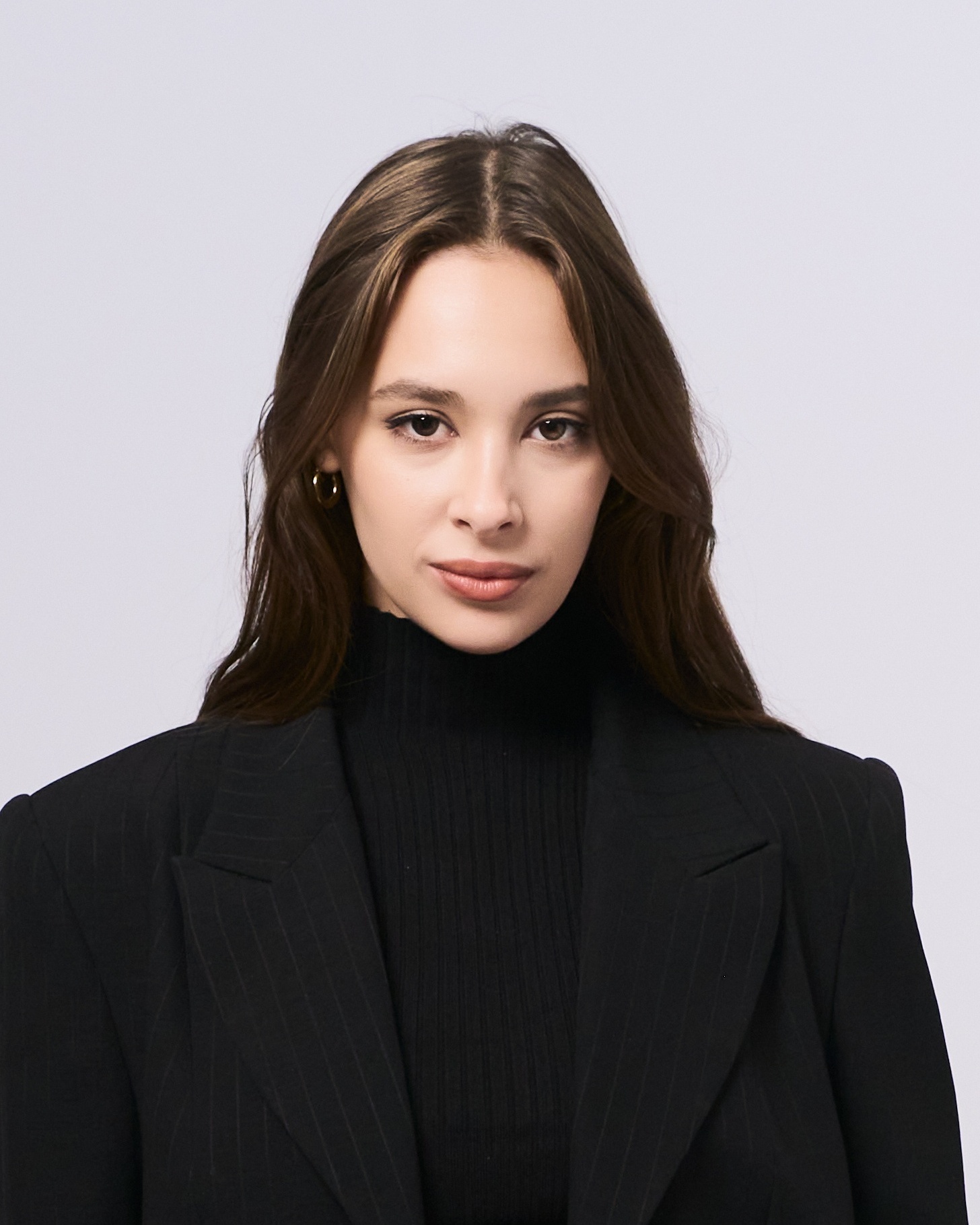 Sesión de fotos profesional - retrato ejecutiva en traje negro