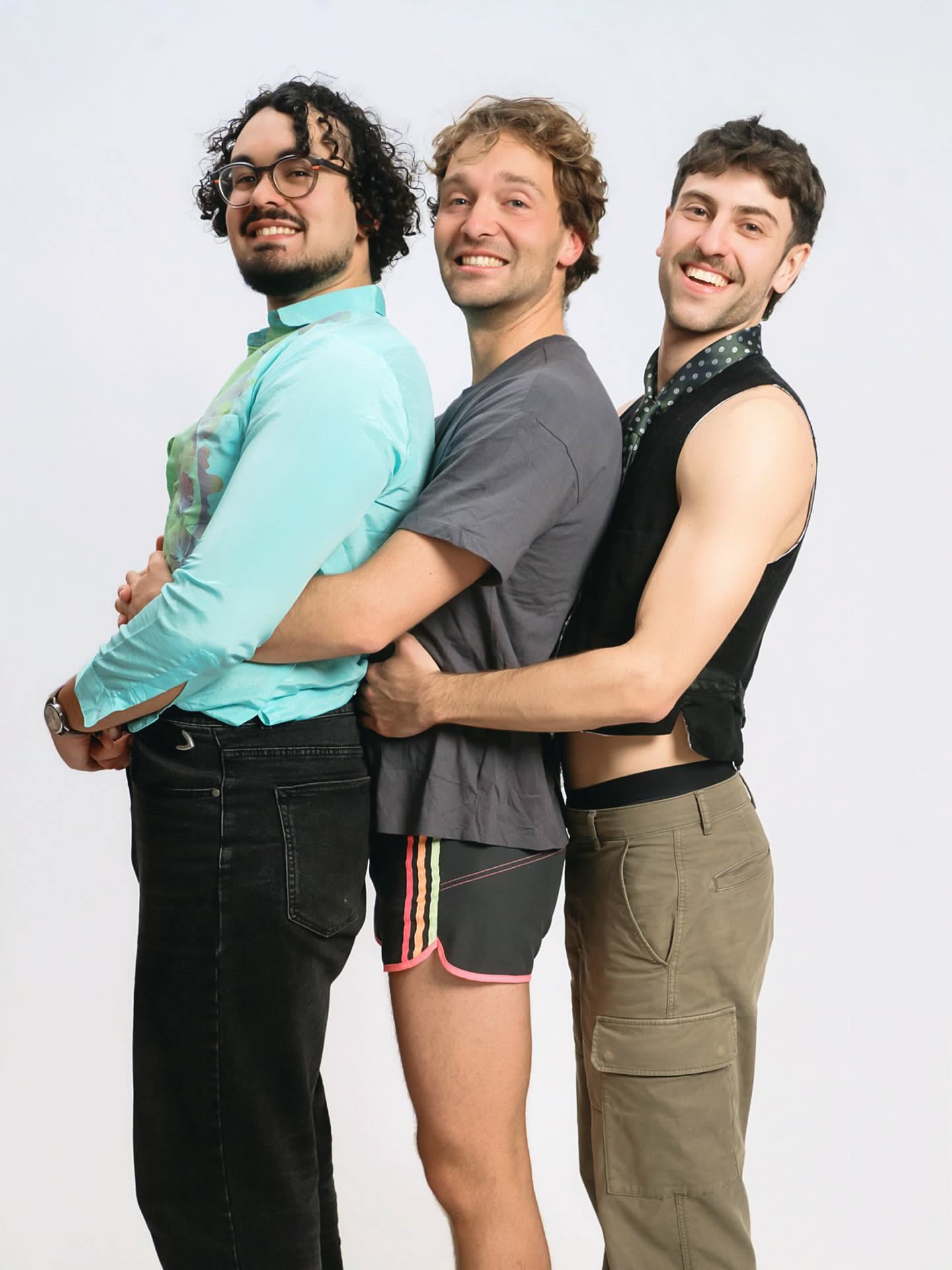 A group of guys in a fun pose during their stag do at YOULO Barcelona